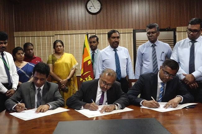 Agreement signed to hand over vehicle number plate printing to new company