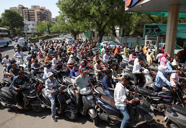 India cuts special excise duties on petrol, diesel