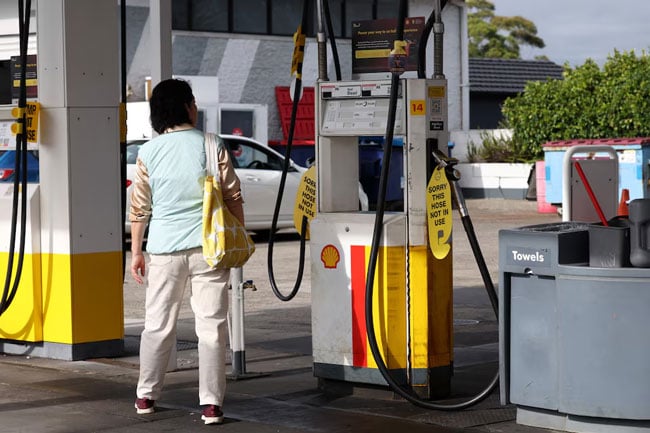 Australia to halve tax on petrol to bring down costs in wake of Iran war