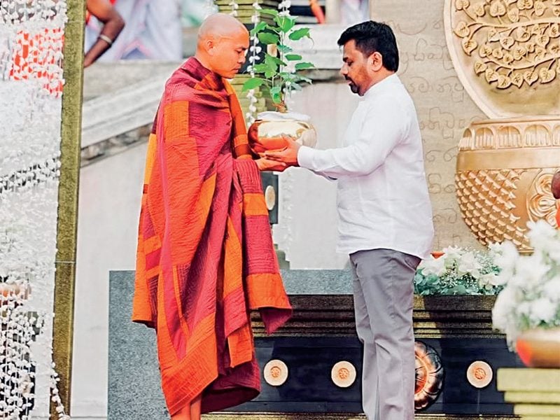 President Anura Kumara Dissanayake handing over a sapling of the Sri Maha Bodhiya in Anuradhapura to Ven Bhikku Pannakara