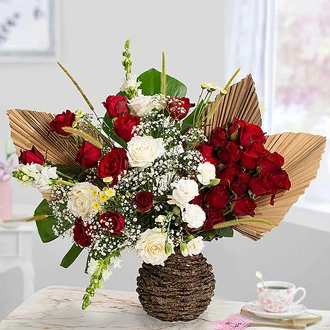 Pure Elegance Premium Flower Arrangement In A Woven Vase  Online for none