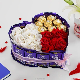 Sweet Petals Choco Collection arranged with 8 ferrero chocolates with Silk flowers Buy valentine Online for specialGifts